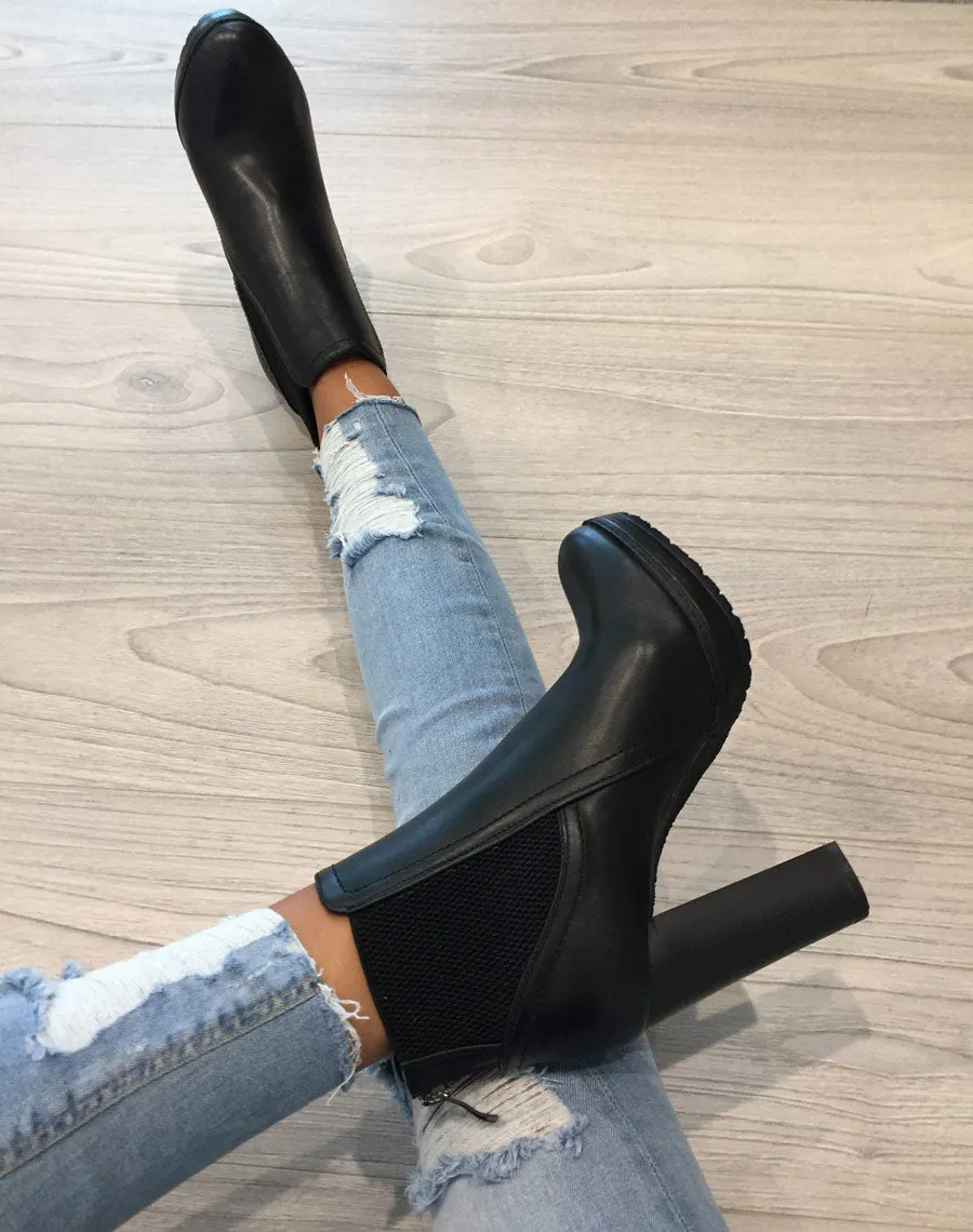Bottines noires à talons avec élastiques