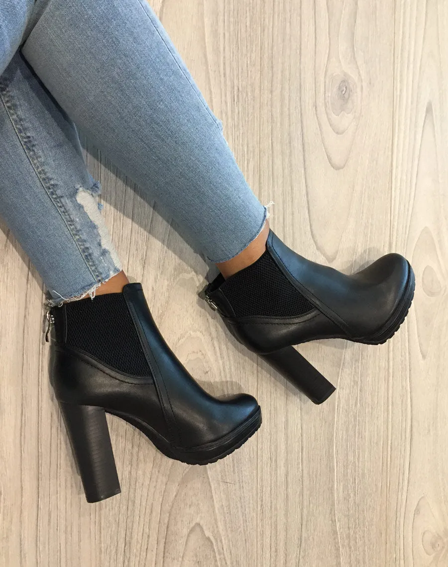 Bottines noires à talons avec élastiques